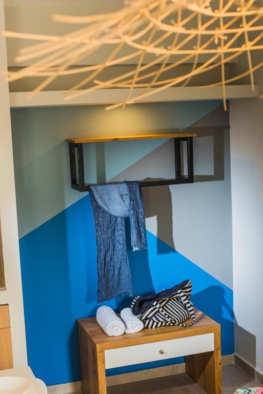 Posteľ alebo postele v izbe v ubytovaní Natali Apartments