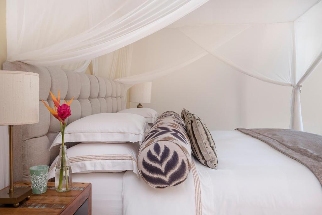 Postel nebo postele na pokoji v ubytování Campo Bahia Hotel Villas Spa