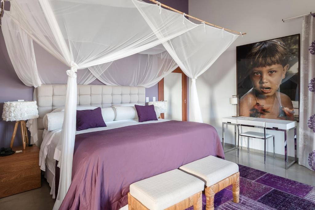 Postel nebo postele na pokoji v ubytování Campo Bahia Hotel Villas Spa