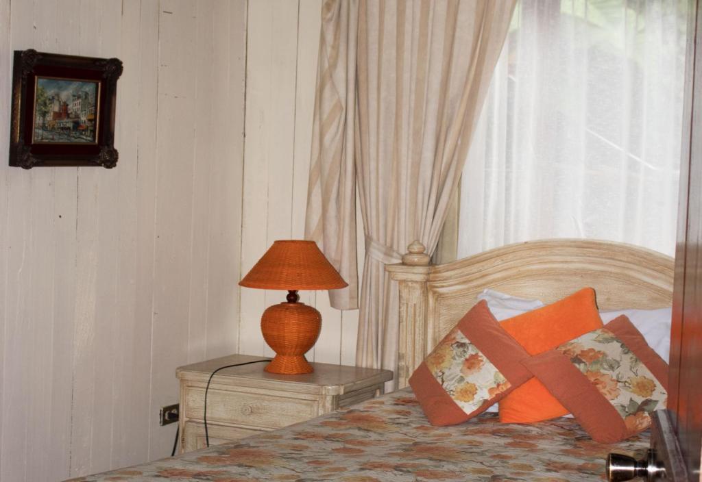 Postel nebo postele na pokoji v ubytování El Septimo Paraiso