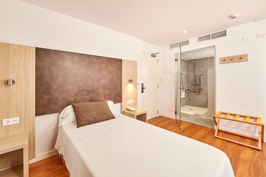 Postel nebo postele na pokoji v ubytování Hotel Principe Wellness&Spa