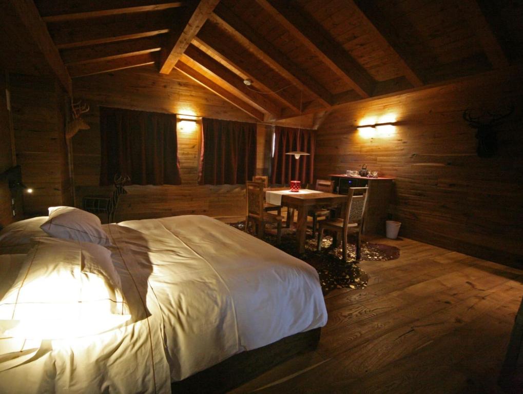 Säng eller sängar i ett rum på Locanda Sensi