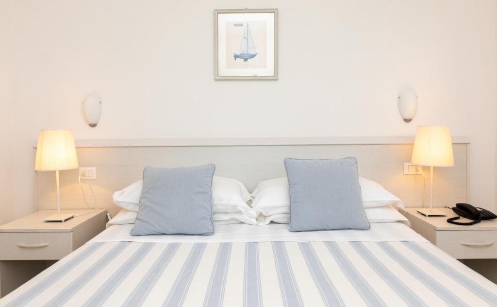 Postel nebo postele na pokoji v ubytování Hotel Plaza Esplanade