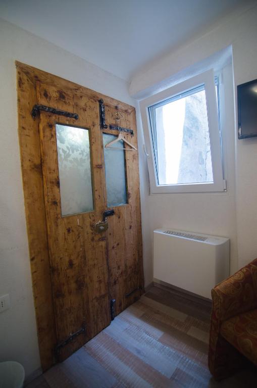 TV a/nebo společenská místnost v ubytování Traditional Piran house
