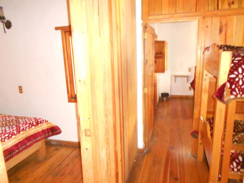 Postel nebo postele na pokoji v ubytování Cabañas los Venados