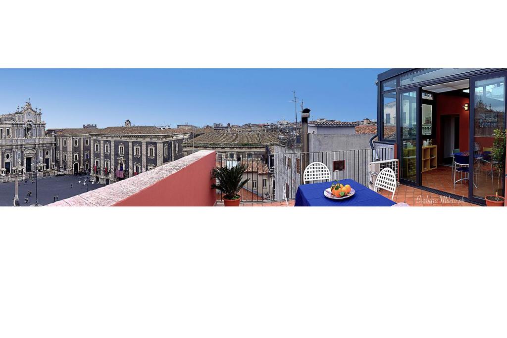 a view of a city from the balcony of a building at Dream House Duomo Catania in Catania
