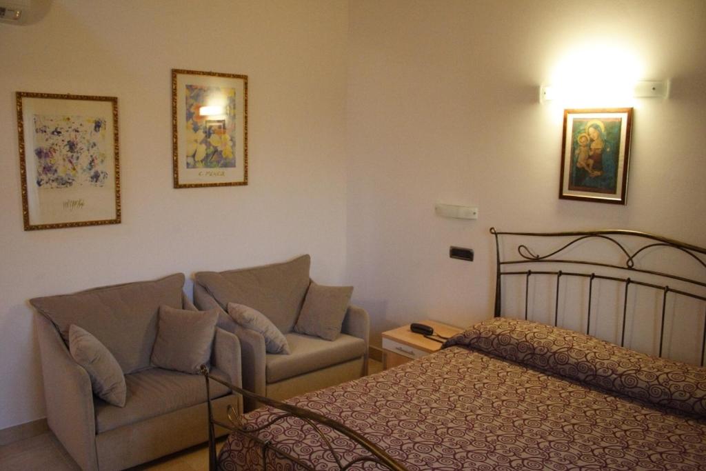 Postel nebo postele na pokoji v ubytování Albergo Bice