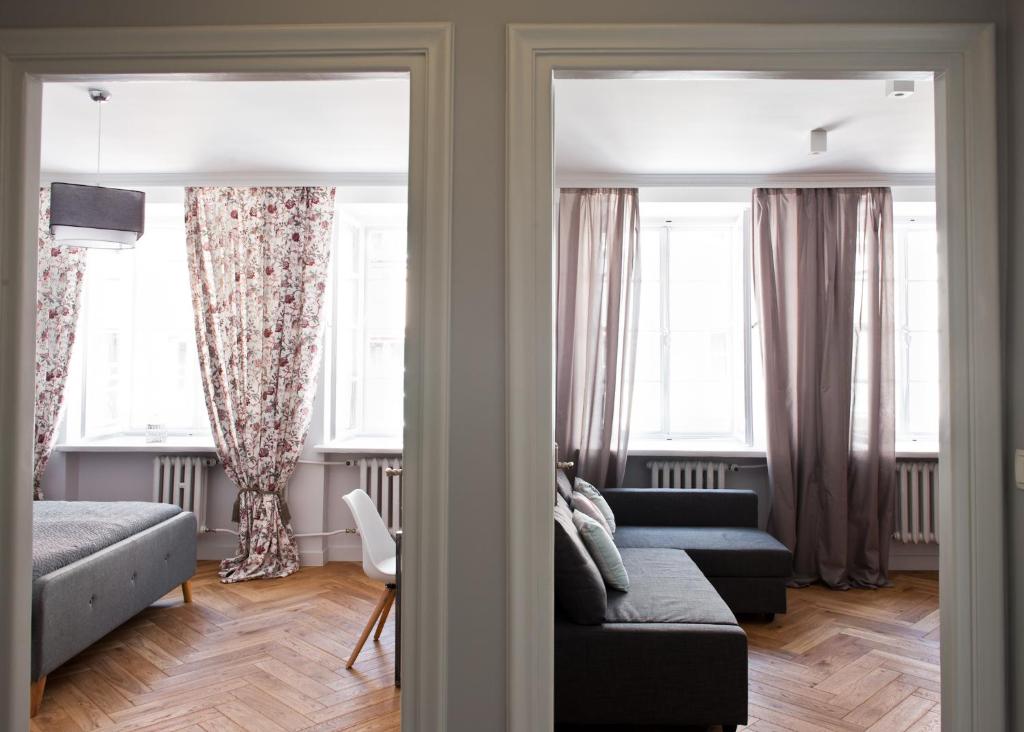 Posteľ alebo postele v izbe v ubytovaní Red Brick Old Town Apartment