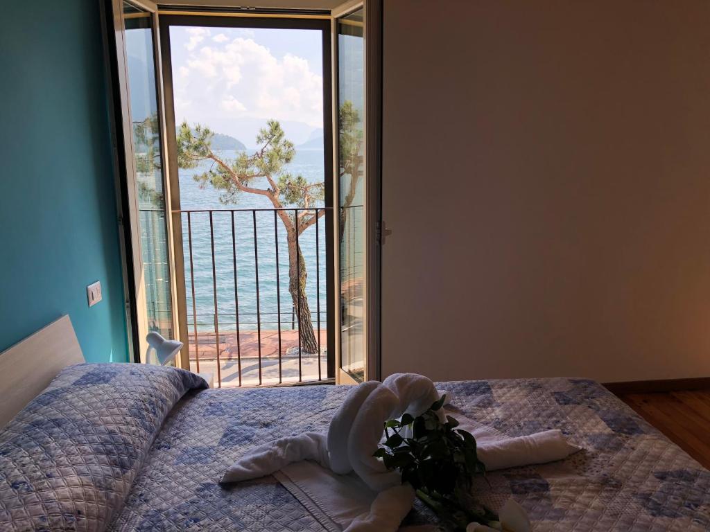 Postel nebo postele na pokoji v ubytování Hotel Mojito