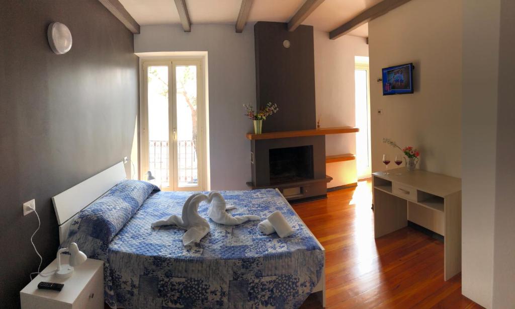Postel nebo postele na pokoji v ubytování Hotel Mojito