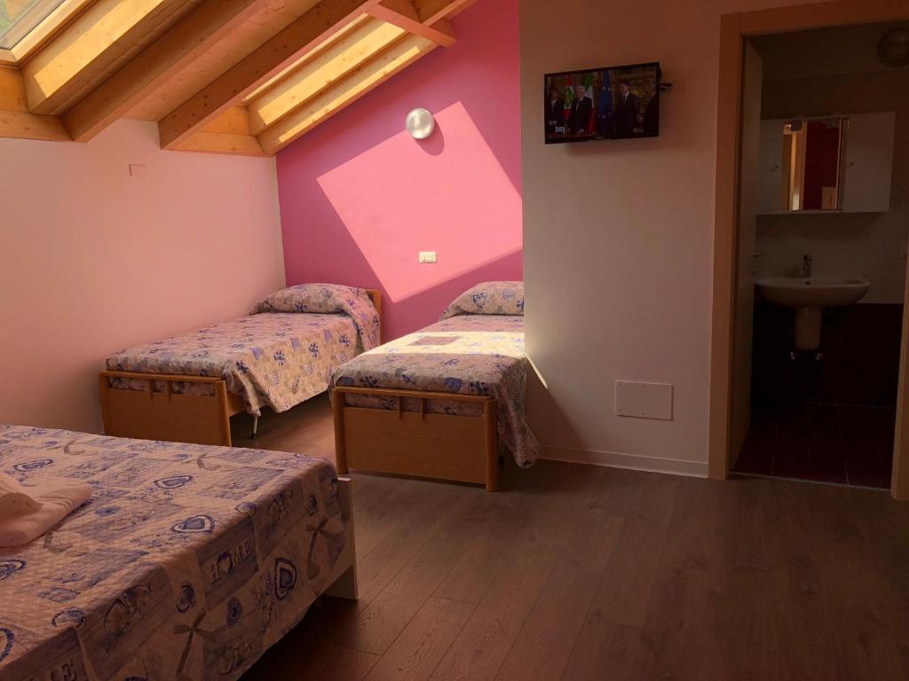 Postel nebo postele na pokoji v ubytování Hotel Mojito