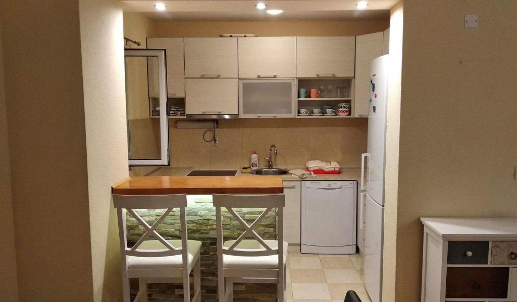 Kuchyň nebo kuchyňský kout v ubytování Lilian Apartments