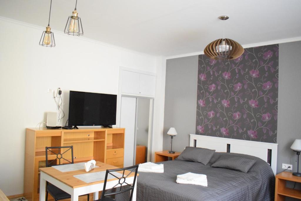 Posteľ alebo postele v izbe v ubytovaní Diamond Astoria Apartments