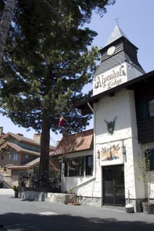 a building with a clock on the top of it at Alpenhof Lodge in Mammoth Lakes