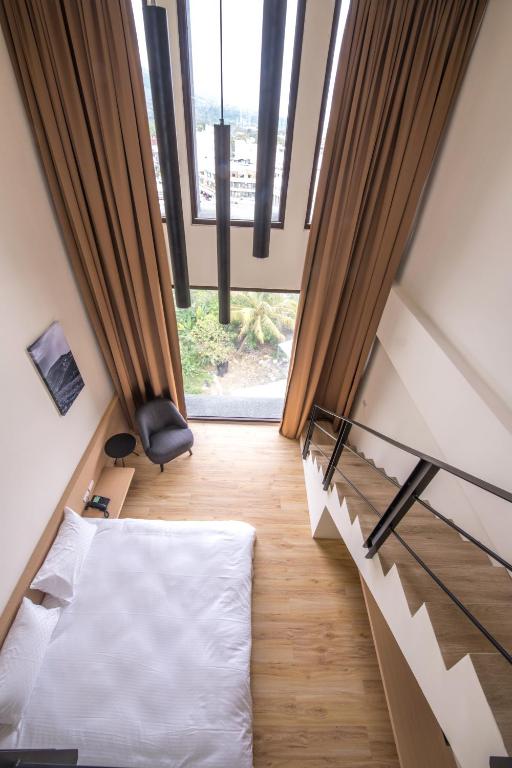 Postel nebo postele na pokoji v ubytování KET Hotel