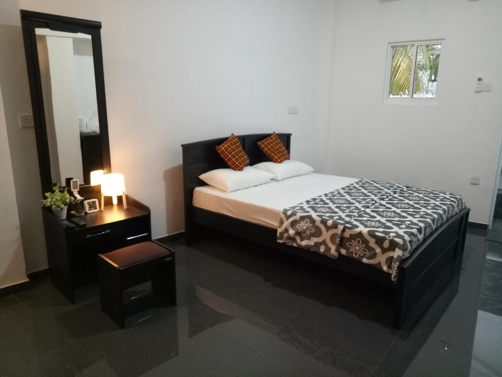 Postel nebo postele na pokoji v ubytování House of Seya