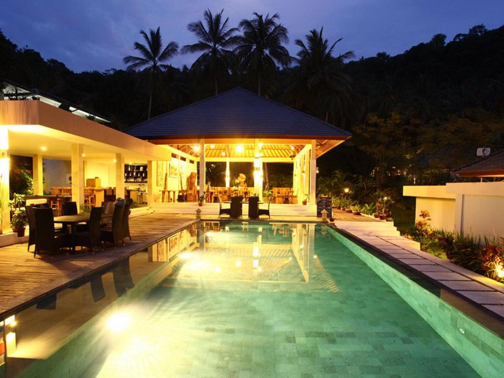 La pileta dentro o cerca de Kebun Villas & Resort