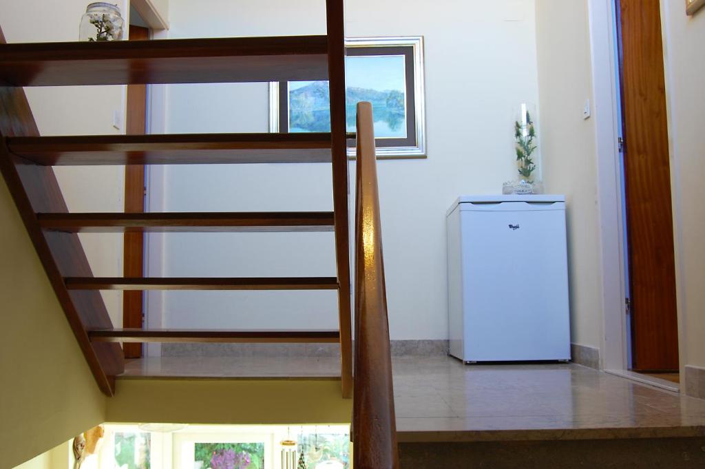 Kuchyň nebo kuchyňský kout v ubytování Apartment and rooms Jurišić