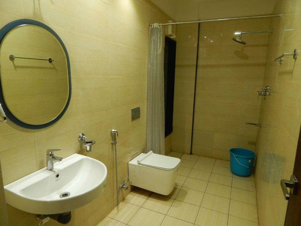 Koupelna v ubytování Hotel Aadhi