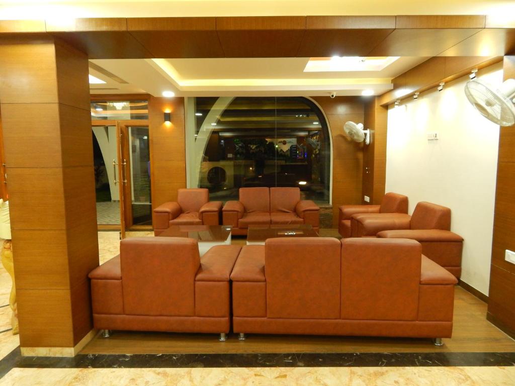 Posezení v ubytování Hotel Aadhi
