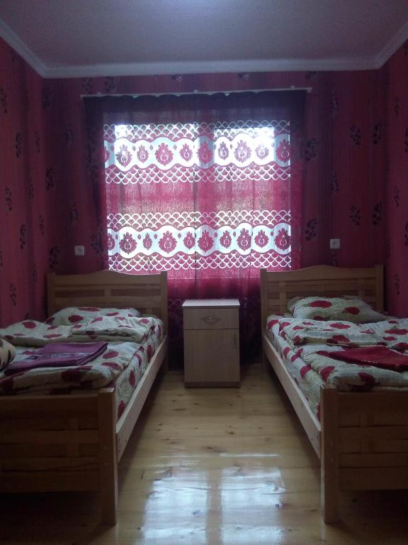 Postel nebo postele na pokoji v ubytování I R K O