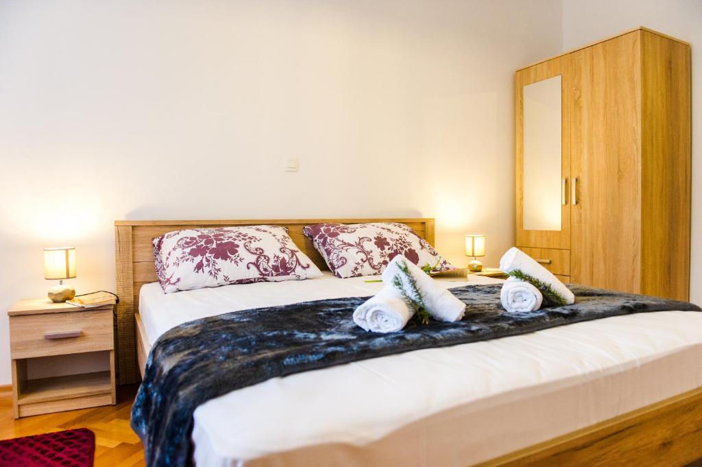 Posteľ alebo postele v izbe v ubytovaní Dundo Baldo Apartment