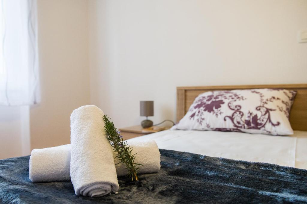 Posteľ alebo postele v izbe v ubytovaní Dundo Baldo Apartment
