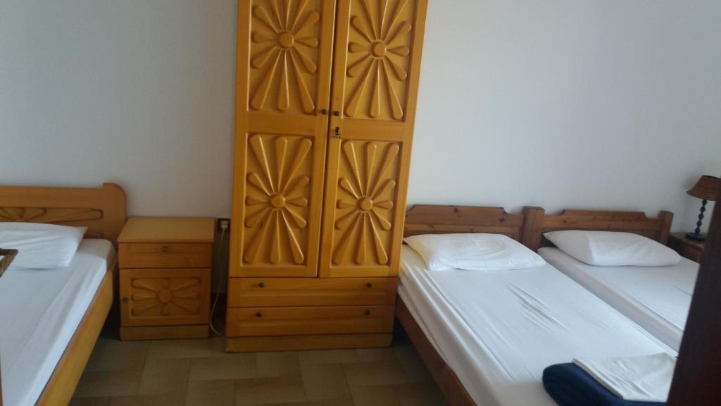 Posteľ alebo postele v izbe v ubytovaní House Kosmas on the beach