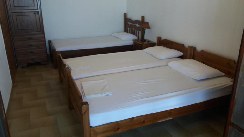 Posteľ alebo postele v izbe v ubytovaní House Kosmas on the beach