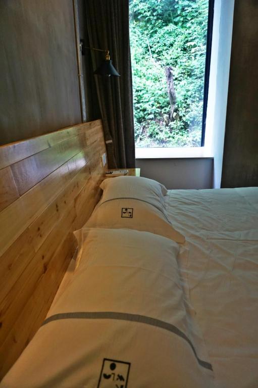 Postel nebo postele na pokoji v ubytování 0517 Boutique Hotel