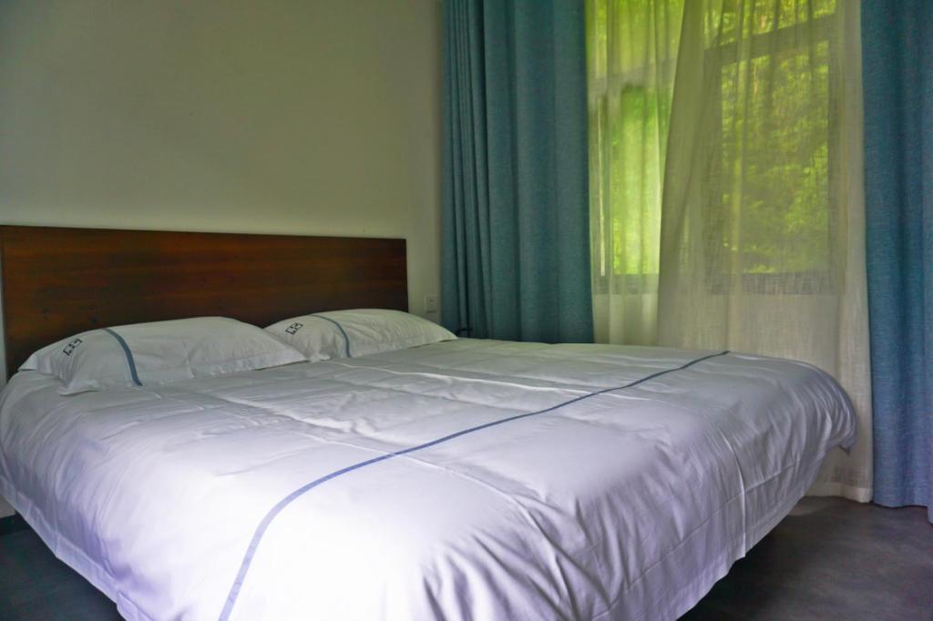 Postel nebo postele na pokoji v ubytování 0517 Boutique Hotel