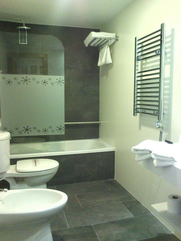 Koupelna v ubytování Hotel Apolo