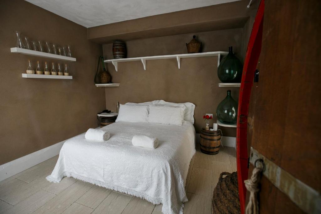 Łóżko lub łóżka w pokoju w obiekcie La Pampa Relais & Spa