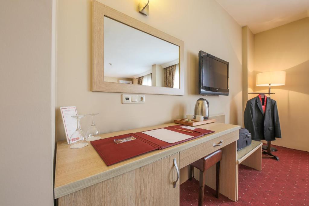 TV a/nebo společenská místnost v ubytování Hostapark Hotel