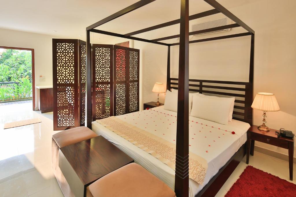Postel nebo postele na pokoji v ubytování Laya Leisure Resort & Spa