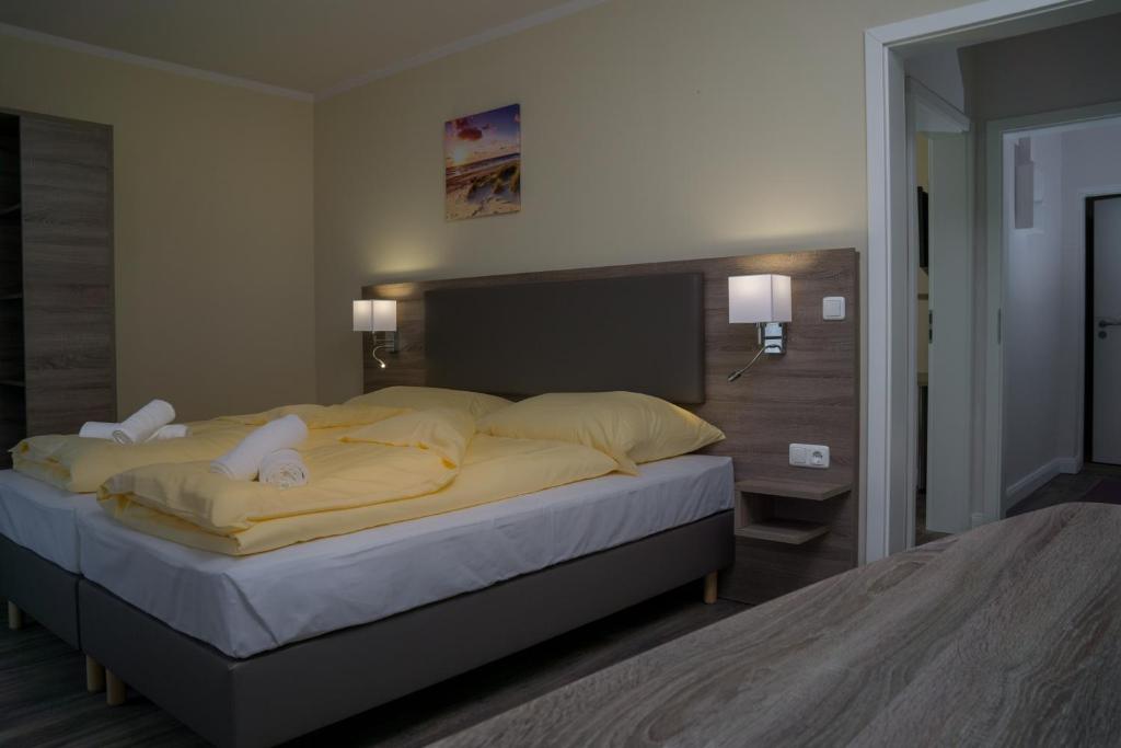 Postel nebo postele na pokoji v ubytování Hotel Dea