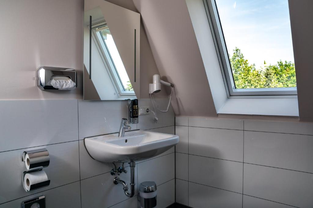 Koupelna v ubytování Hotel Dea