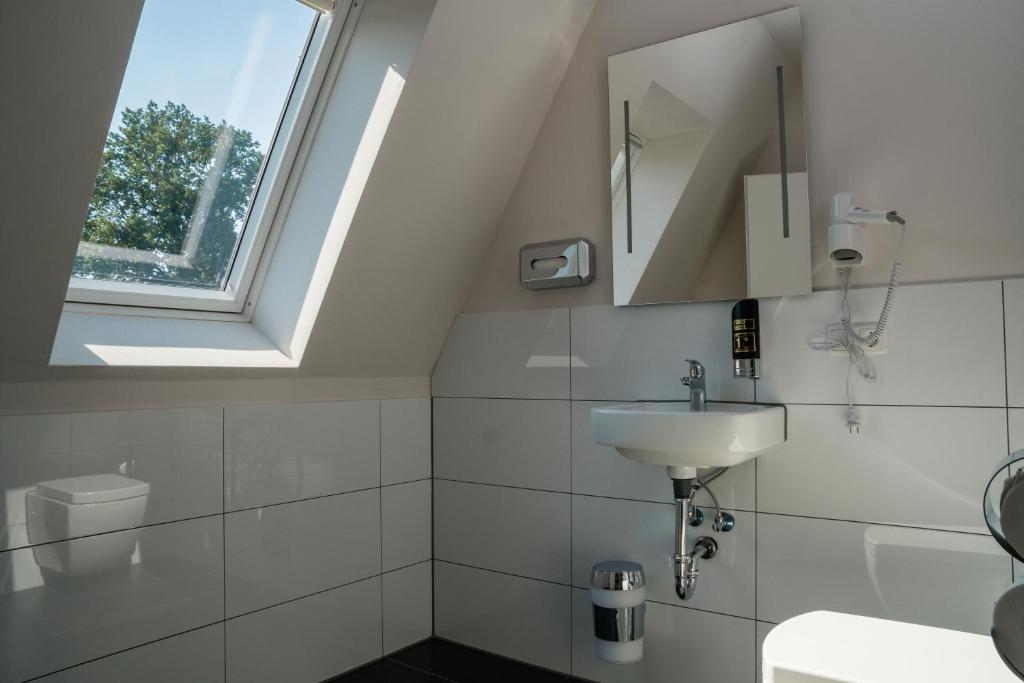 Koupelna v ubytování Hotel Dea