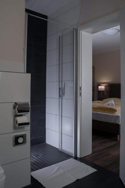 Postel nebo postele na pokoji v ubytování Hotel Dea