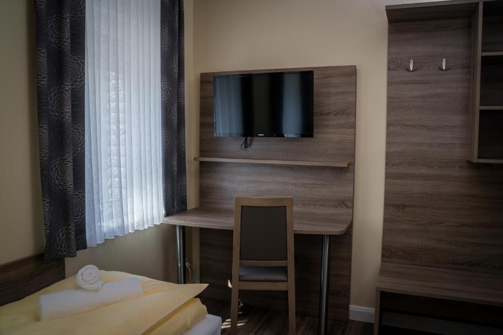 TV a/nebo společenská místnost v ubytování Hotel Dea