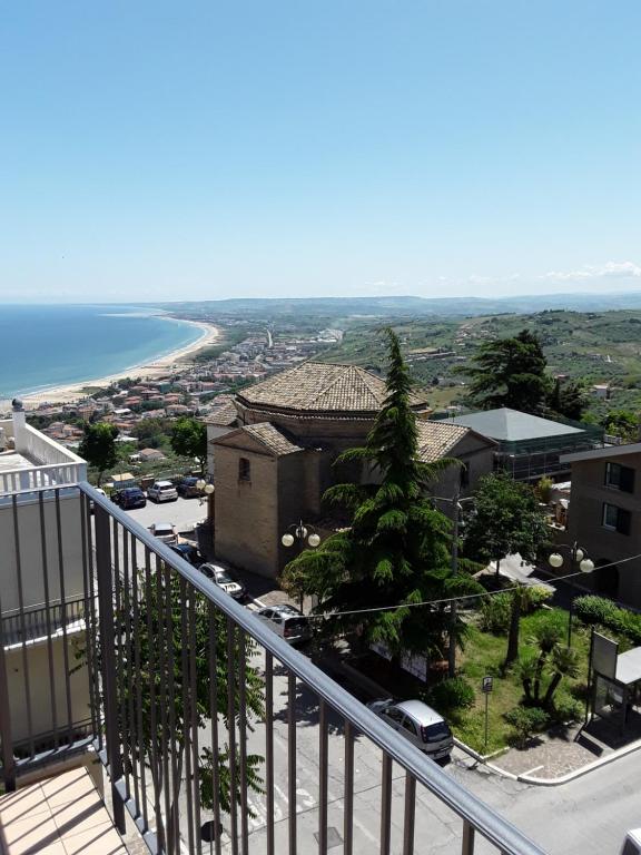 a view from a balcony of a building and the ocean at Hotel Dei Sette in Vasto