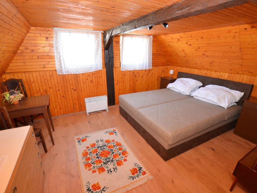 Postel nebo postele na pokoji v ubytování Vacation House Featuring Sauna