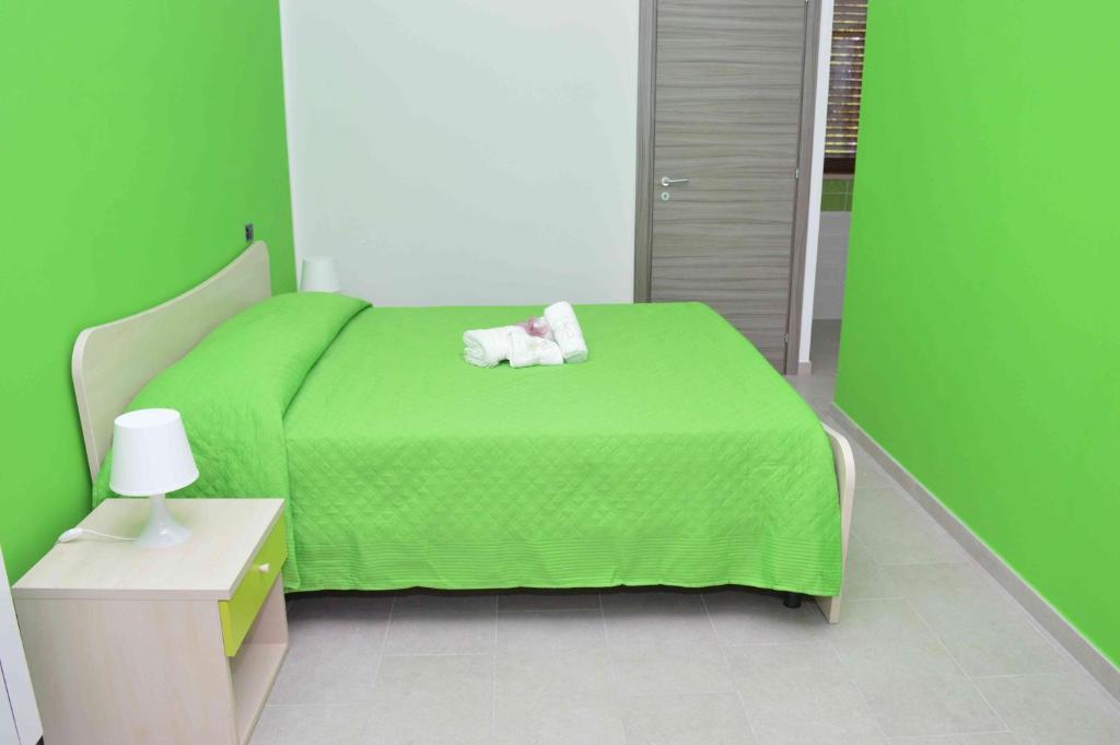 Postel nebo postele na pokoji v ubytování Prima Luce