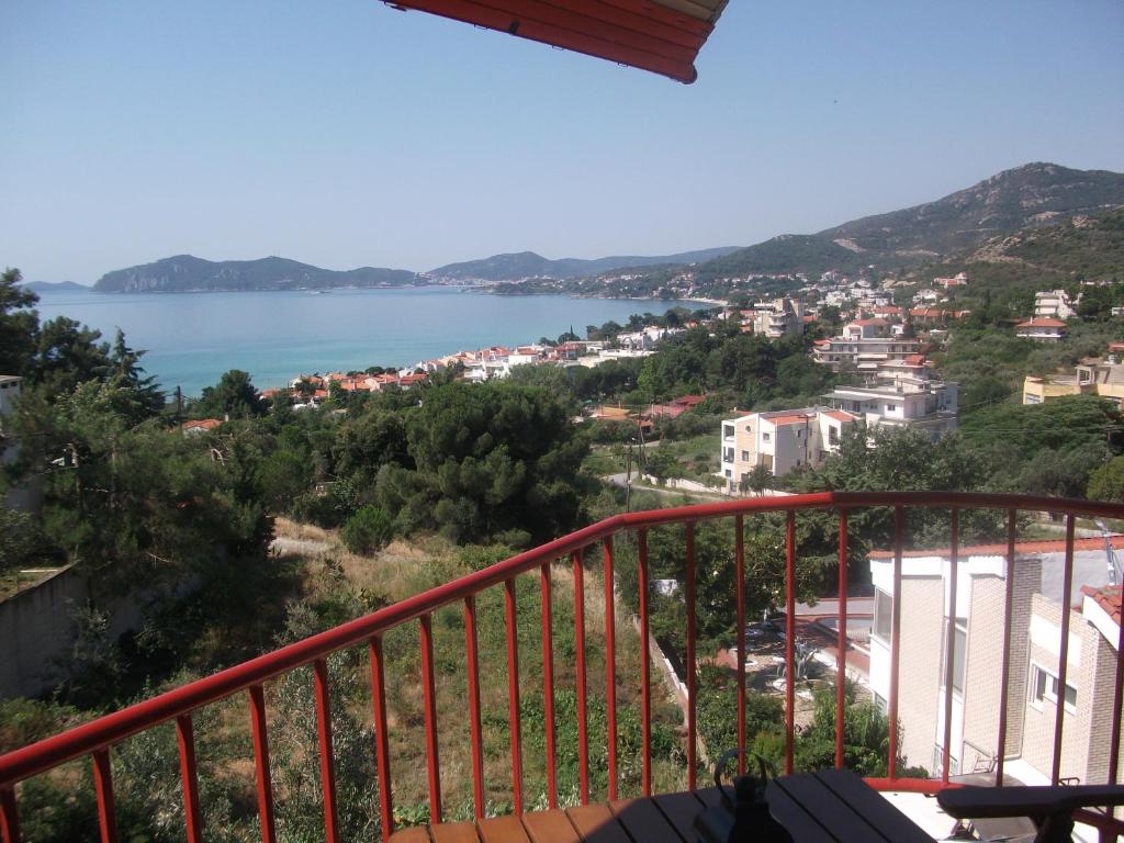 a view of the water from a balcony at Konstantina’s House in Paleo Tsifliki