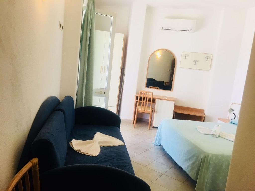 Postel nebo postele na pokoji v ubytování Hotel Casa Gerardo