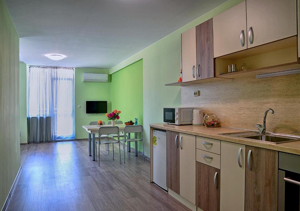 Kuchyň nebo kuchyňský kout v ubytování Visito Aparthouse