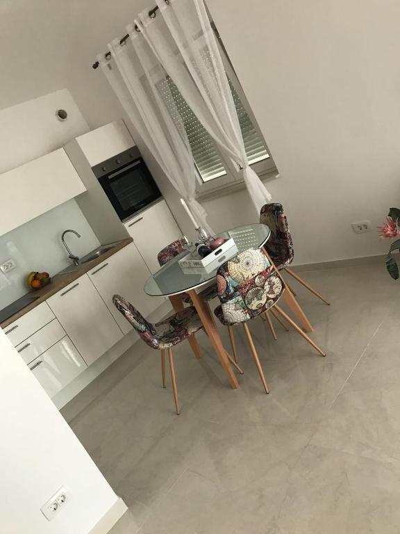 Kuchyň nebo kuchyňský kout v ubytování Sweet Apartments