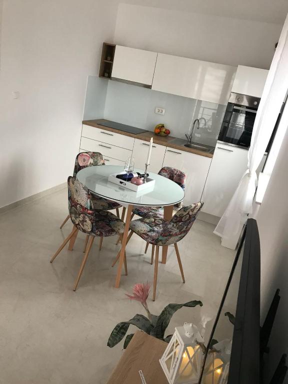 Kuchyň nebo kuchyňský kout v ubytování Sweet Apartments