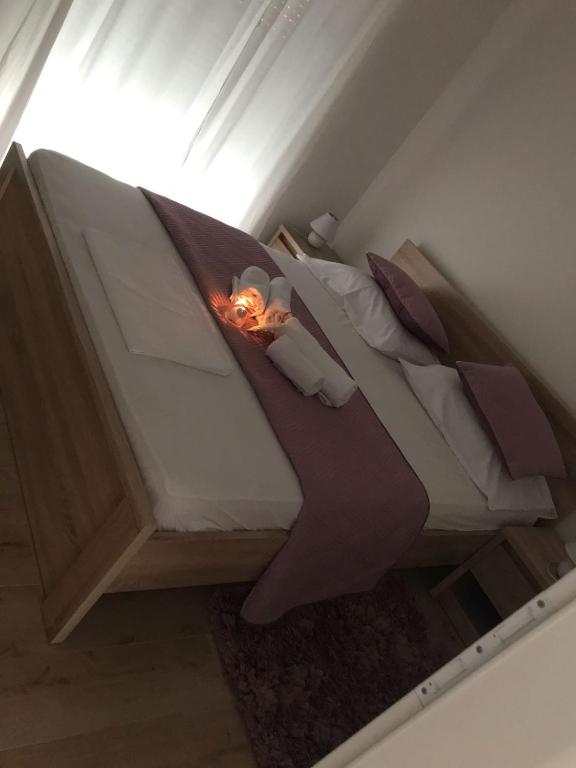 Postel nebo postele na pokoji v ubytování Sweet Apartments