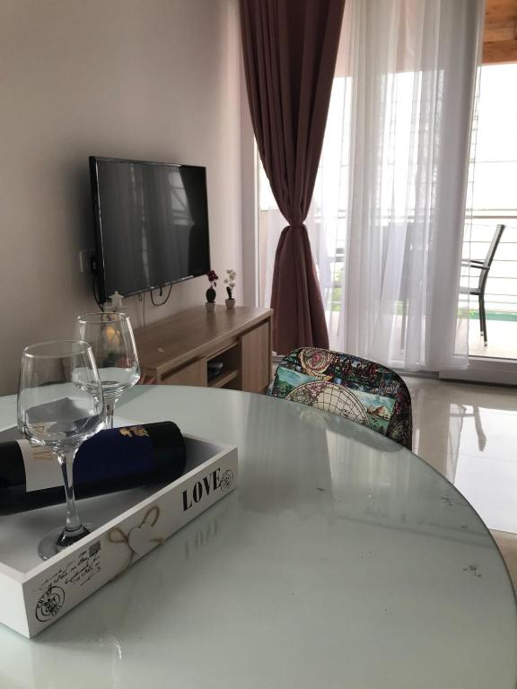 TV a/nebo společenská místnost v ubytování Sweet Apartments